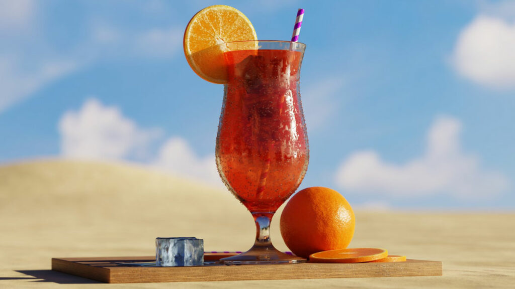 A cocktail in a tulip glass with an orange on its rim and straw in the glass. It's on a wooden plank in the desert.