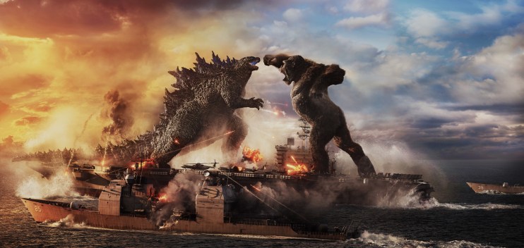 Promotional photograph from the production company, Legendary, showing a scene moments before Godzilla and King Kong begin fighting on a battleship.